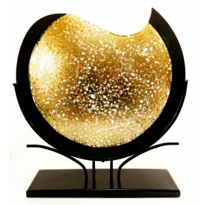 Front view of this glistening vase - showing the sporadic sections of true transparency against the majority of the golden body, which is relatively opaque but translucent, while the black is utterly opaque. Notice how the base piece frames the silhouette of the vase.