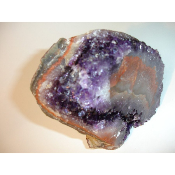 images Real amethyst geode. Compare it to the soap rock.